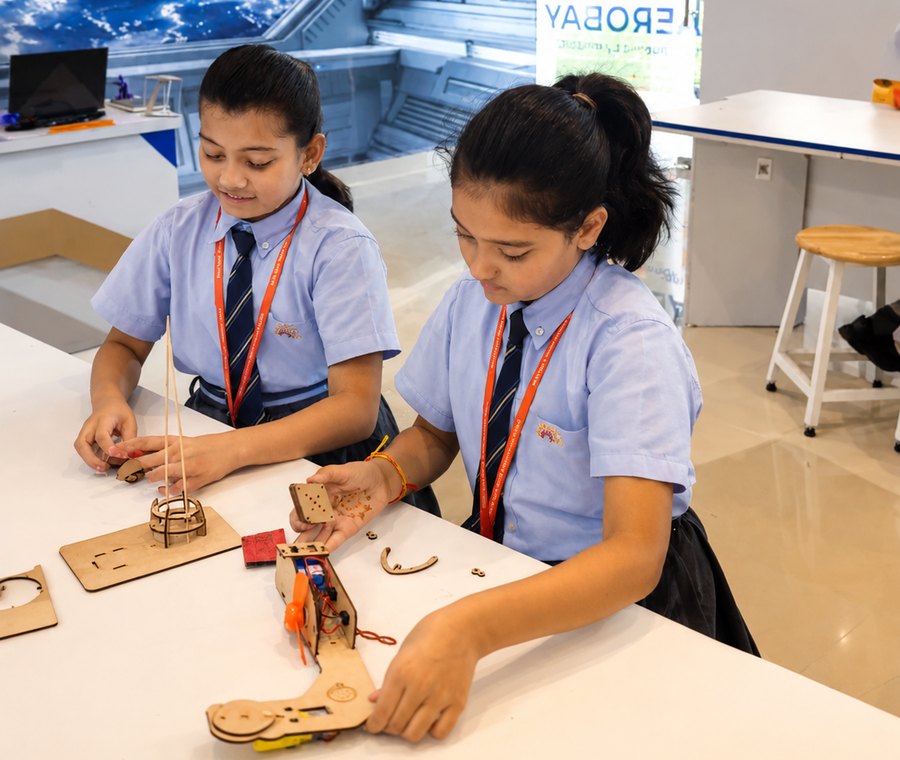 Sorting the pieces at the bench, the Aerobay at Birla Open Minds International School, Bhopal