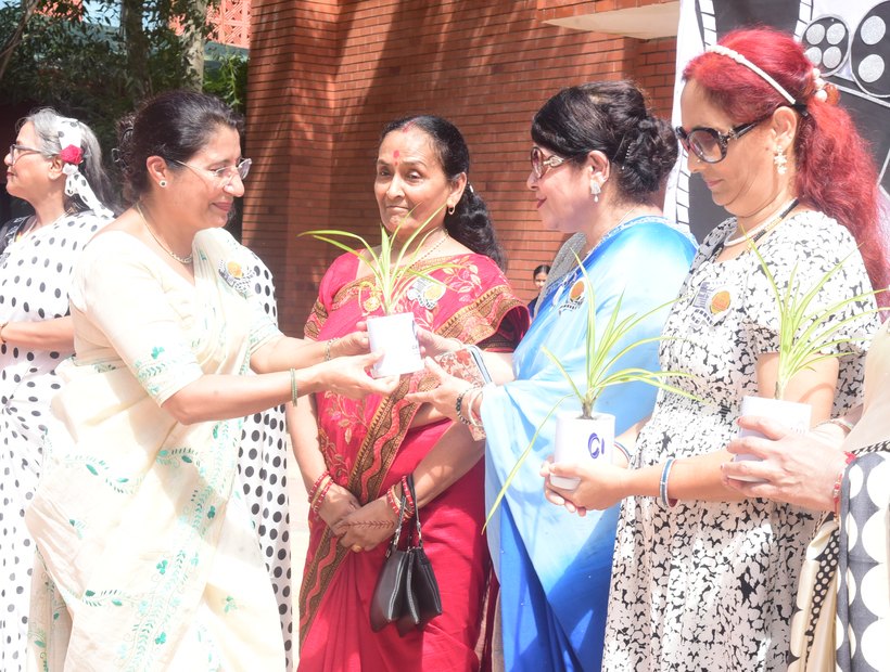 A sapling handed across at Birla Open Minds International School, Bhopal