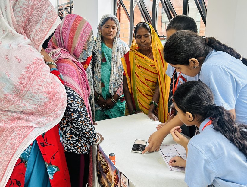 A crowd around the students' help desk at Birla Open Minds International School, Bhopal