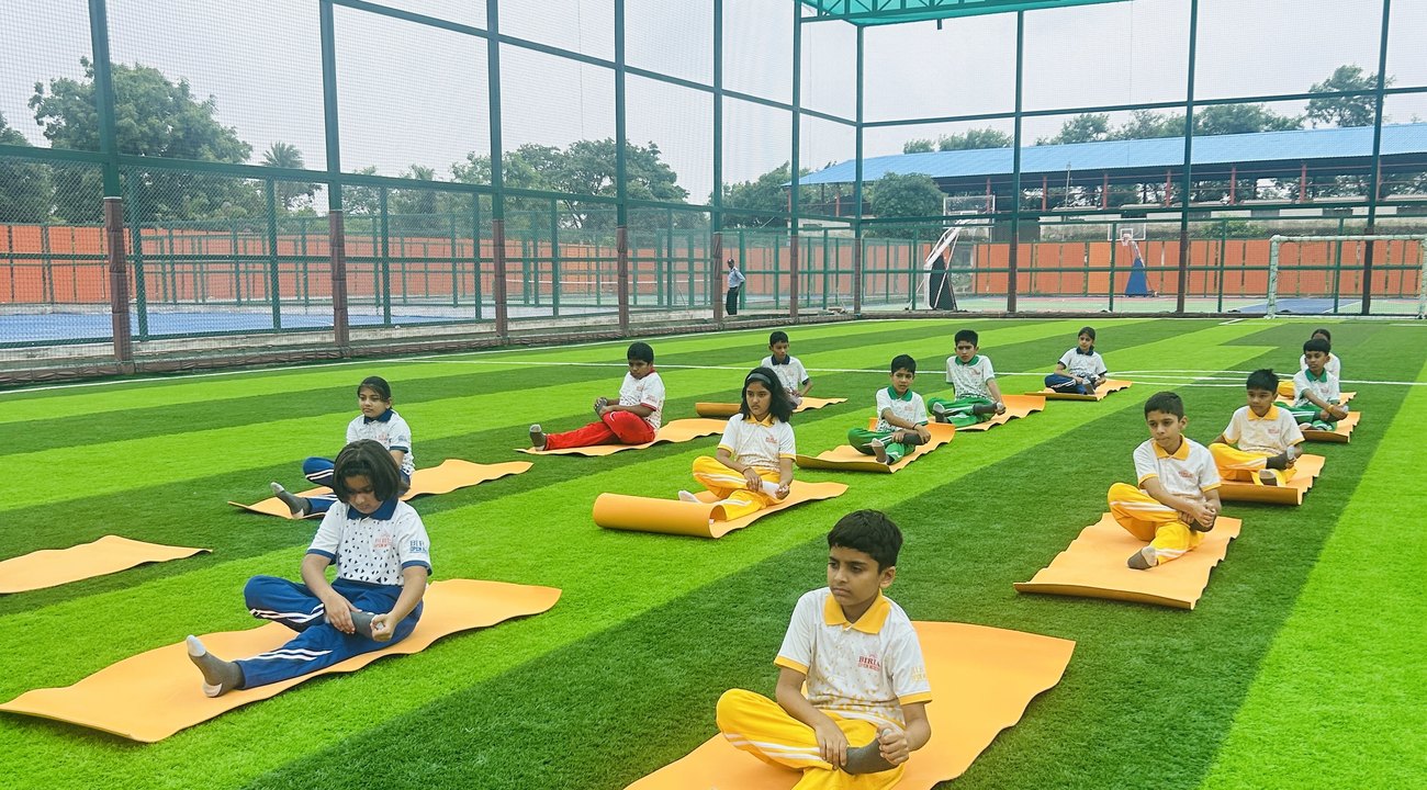The whole group, one mat each at Birla Open Minds International School, Bhopal