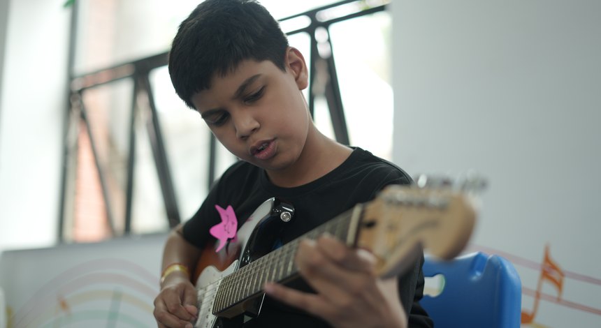 A guitar, and a hall listening, The Rising Stars Championship at Birla Open Minds International School, Bhopal